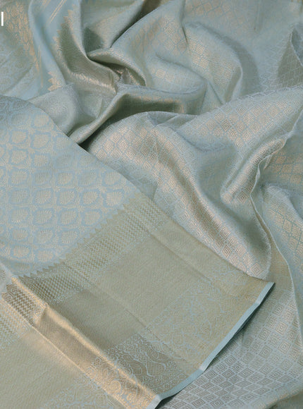 Pure kanchipuram silk saree pastel blue with allover silver zari woven brocade weaves and long zari woven border