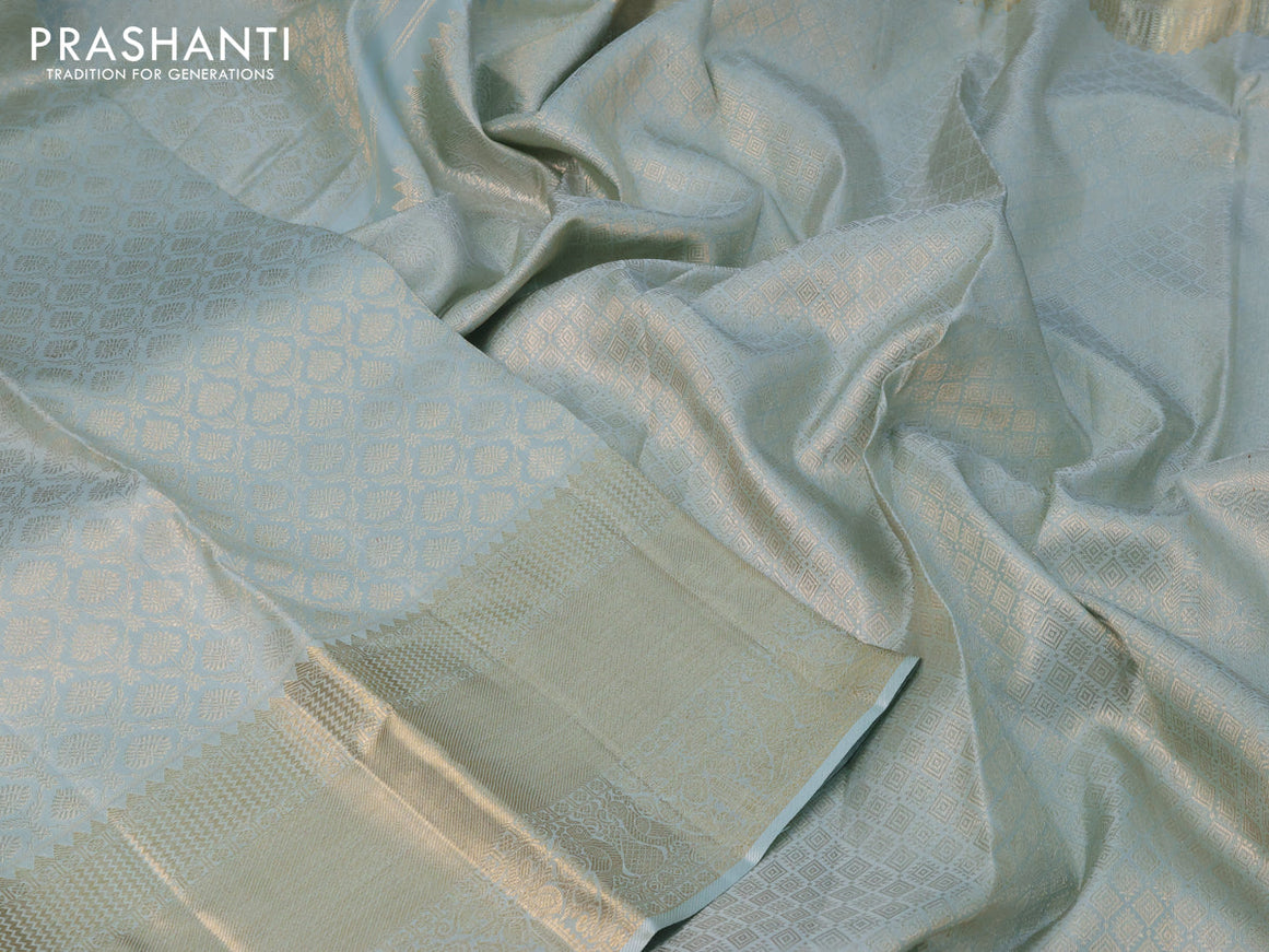 Pure kanchipuram silk saree pastel blue with allover silver zari woven brocade weaves and long zari woven border