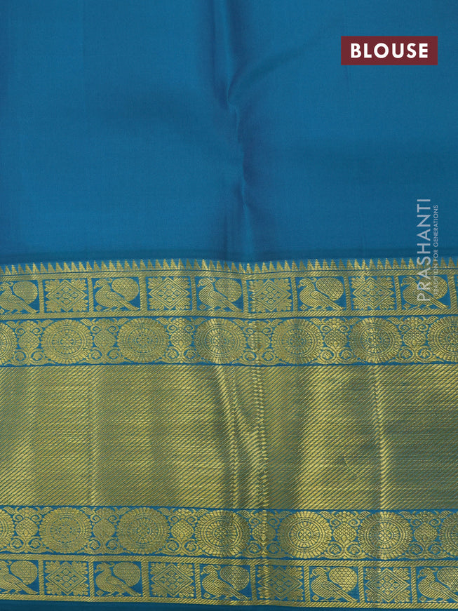 Pure kanchipuram silk saree pastel pink and peacock green with allover silver zari woven brocade weaves and long zari woven border