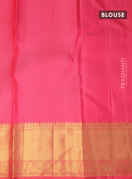 Pure kanchipuram silk saree mustard yellow and pink shade with allover zari woven floral design brocade weaves and zari woven border