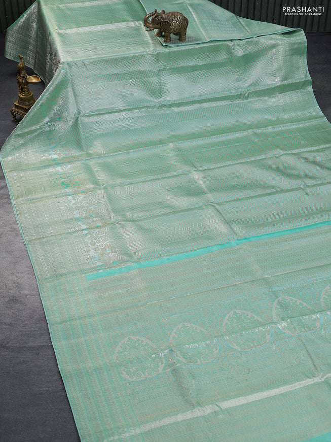 Pure kanchipuram tissue silk saree teal blue with allover zari woven brocade weaves and zari woven border