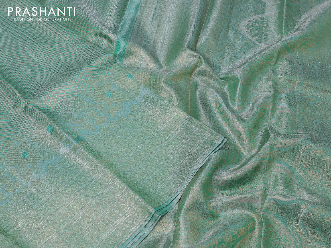 Pure kanchipuram tissue silk saree teal blue with allover zari woven brocade weaves and zari woven border