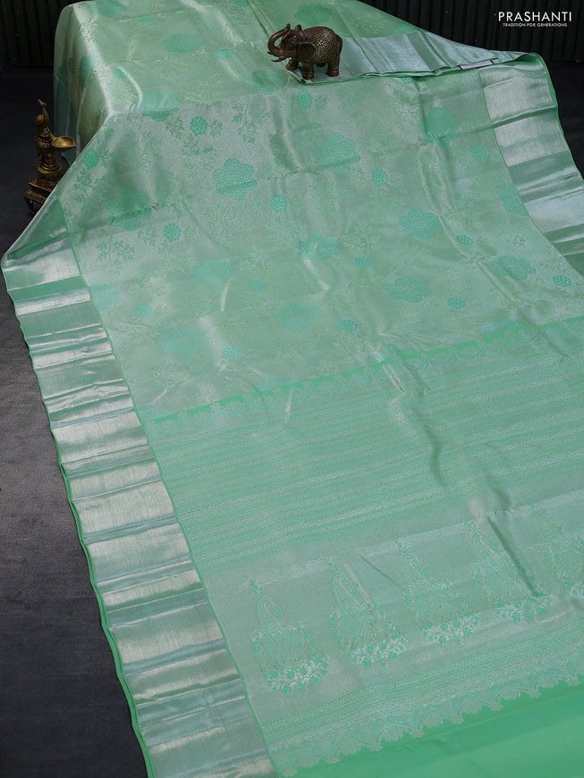 Pure kanchipuram tissue silk saree teal green with allover silver zari woven brocade weaves and silver zari woven border