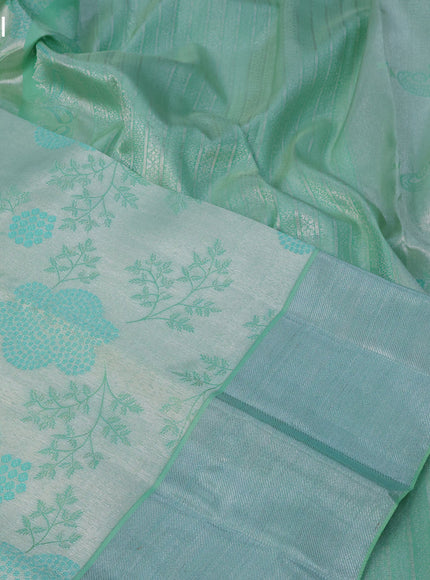 Pure kanchipuram tissue silk saree teal green with allover silver zari woven brocade weaves and silver zari woven border