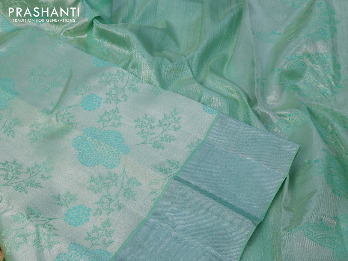 Pure kanchipuram tissue silk saree teal green with allover silver zari woven brocade weaves and silver zari woven border