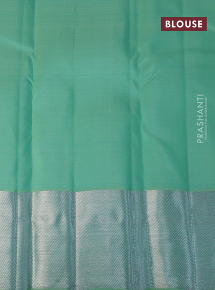 Pure kanchipuram tissue silk saree teal green with allover silver zari woven brocade weaves and silver zari woven border