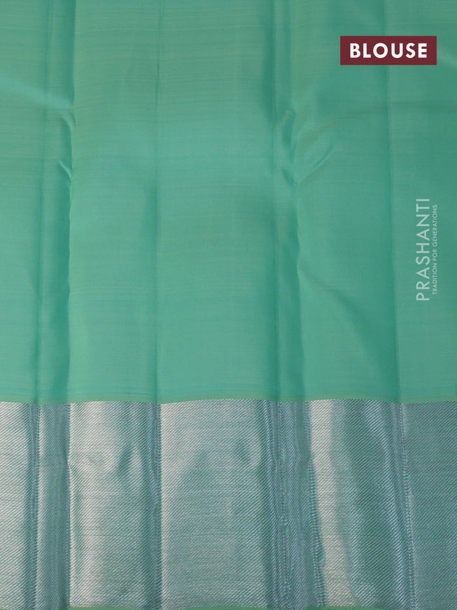 Pure kanchipuram tissue silk saree teal green with allover silver zari woven brocade weaves and silver zari woven border