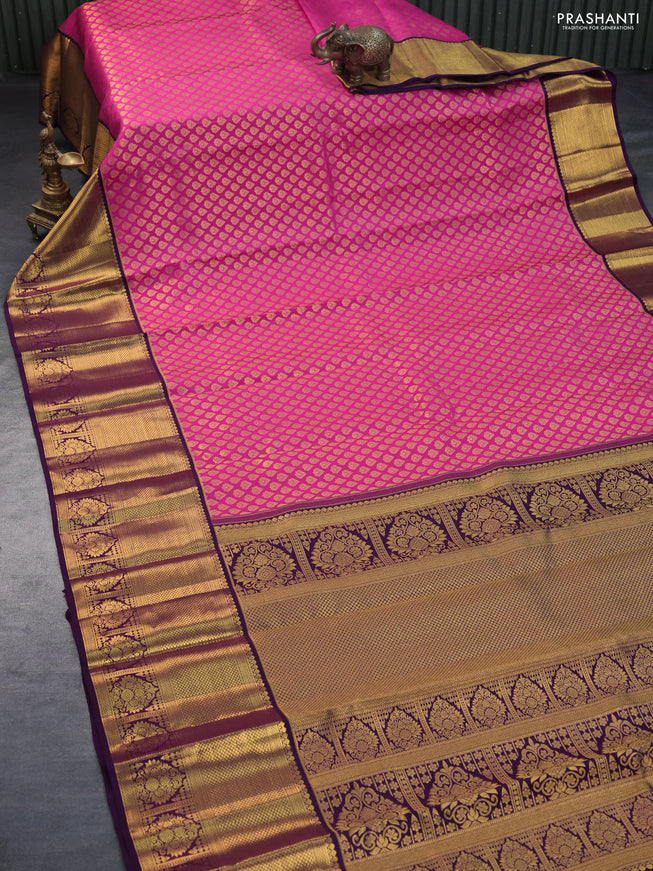 Pure kanchipuram silk saree pink and deep purple with allover zari woven butta weaves and long zari woven border