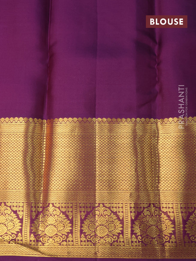 Pure kanchipuram silk saree pink and deep purple with allover zari woven butta weaves and long zari woven border