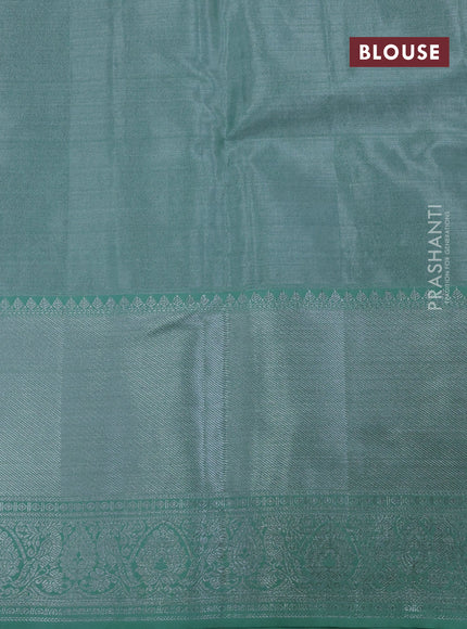 Pure kanchipuram tissue silk saree pastel green with allover silver zari woven brocade weaves and long silver zari woven border