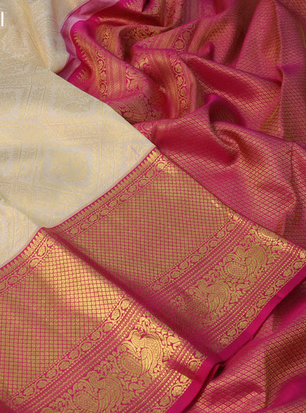 Pure kanchipuram silk saree cream and pink with allover zari woven brocade weaves and long zari woven border