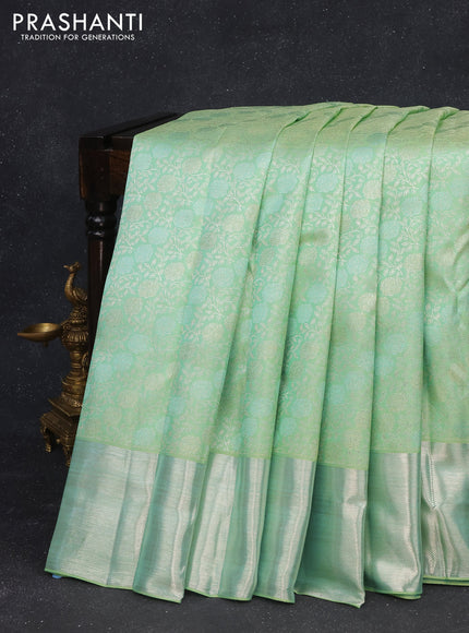 Pure kanchipuram silk saree pastel green with allover silver zari woven floral brocade weaves and silver zari woven border