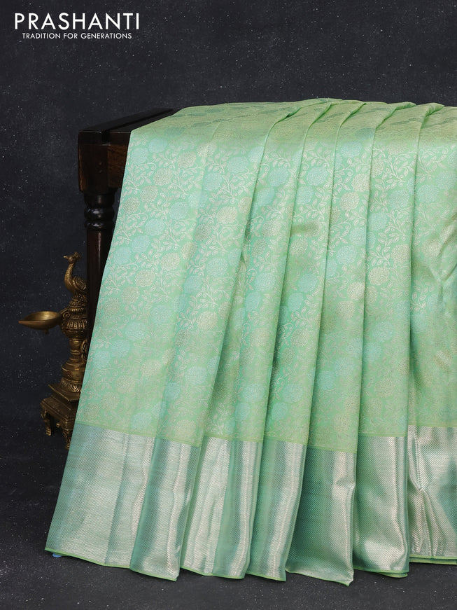 Pure kanchipuram silk saree pastel green with allover silver zari woven floral brocade weaves and silver zari woven border