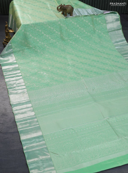 Pure kanchipuram silk saree pastel green with allover silver zari woven floral brocade weaves and silver zari woven border