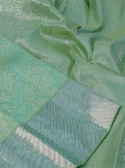 Pure kanchipuram silk saree pastel green with allover silver zari woven floral brocade weaves and silver zari woven border