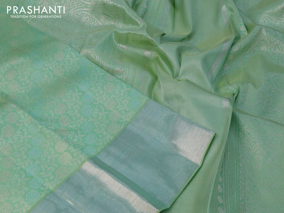 Pure kanchipuram silk saree pastel green with allover silver zari woven floral brocade weaves and silver zari woven border