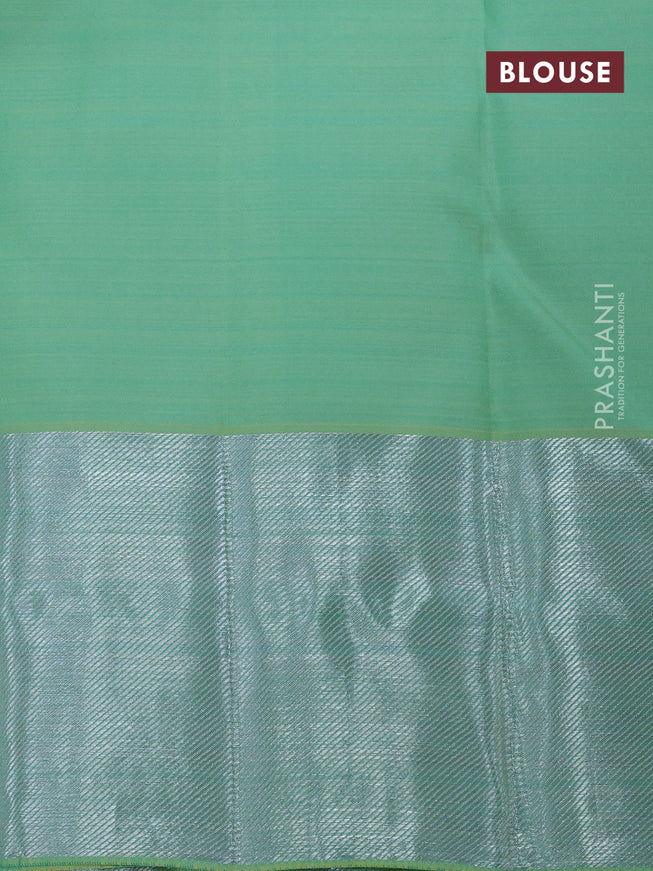 Pure kanchipuram silk saree pastel green with allover silver zari woven floral brocade weaves and silver zari woven border