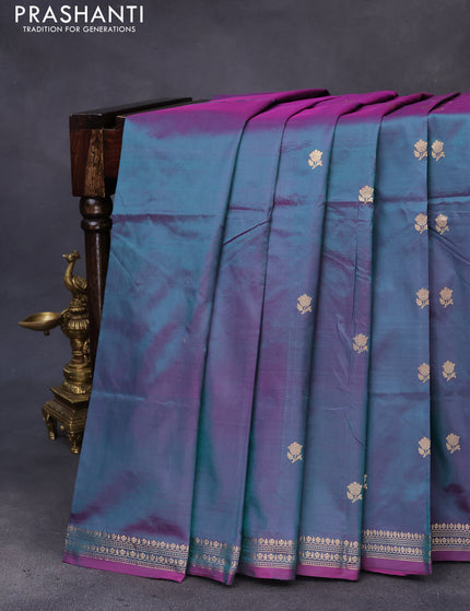 Banarasi katan silk saree dual shade of greenish purple with zari woven buttas and zari woven border