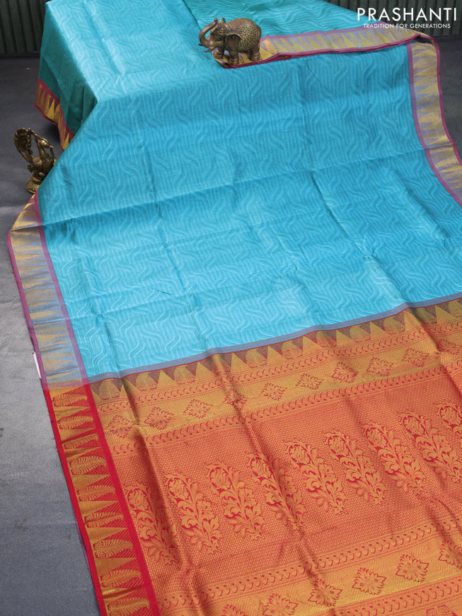 Silk cotton saree blue shade and red with allover self emboss jacquard and rich zari woven border