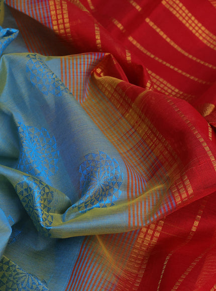 Silk cotton saree dual shade of bluish yellow and red with allover self emboss jacquard and rich zari woven border