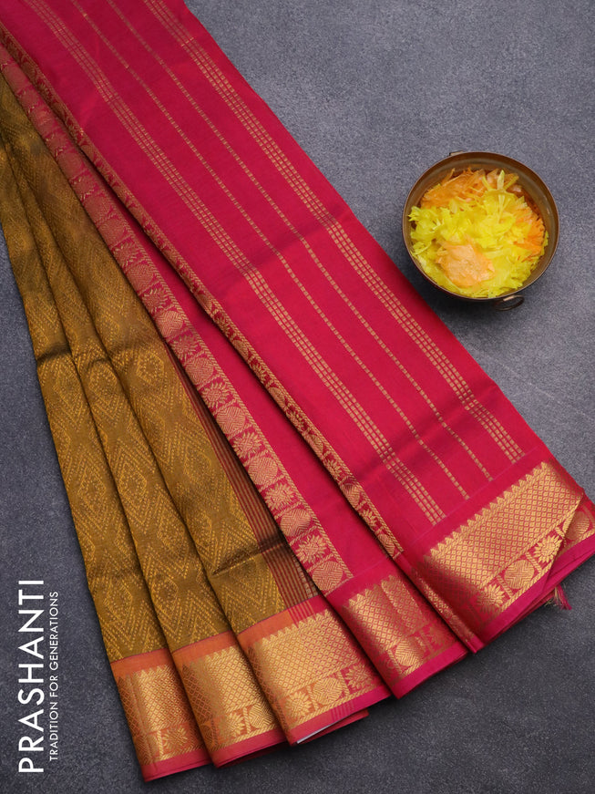 Silk cotton saree dark mustard yellow and magenta pink with allover self emboss jacquard and rich zari woven border