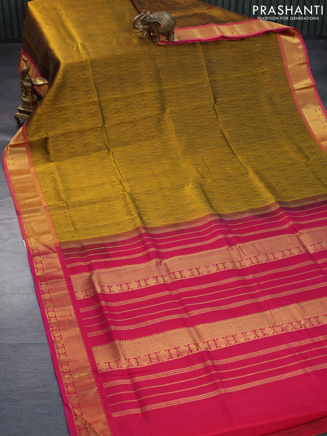 Silk cotton saree dark mustard yellow and magenta pink with allover self emboss jacquard and rich zari woven border