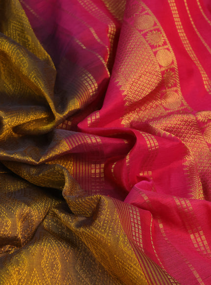 Silk cotton saree dark mustard yellow and magenta pink with allover self emboss jacquard and rich zari woven border