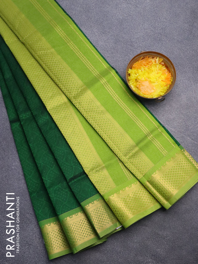 Silk cotton saree bottle green and light green with allover self emboss jacquard and rich zari woven border