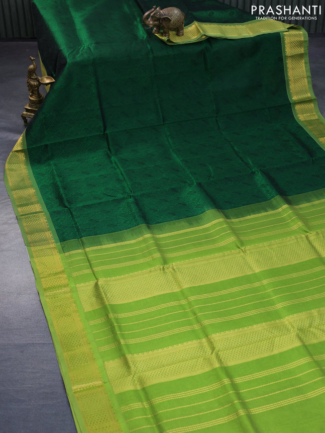 Silk cotton saree bottle green and light green with allover self emboss jacquard and rich zari woven border