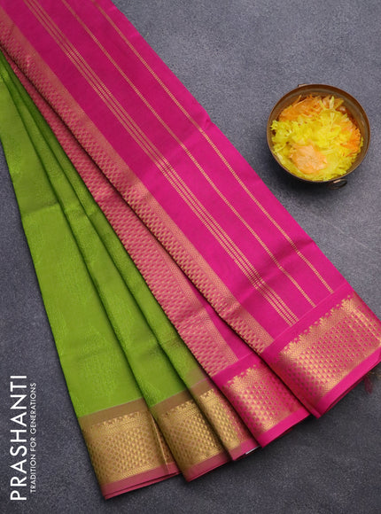 Silk cotton saree light green and pink with allover self emboss jacquard and rich zari woven border