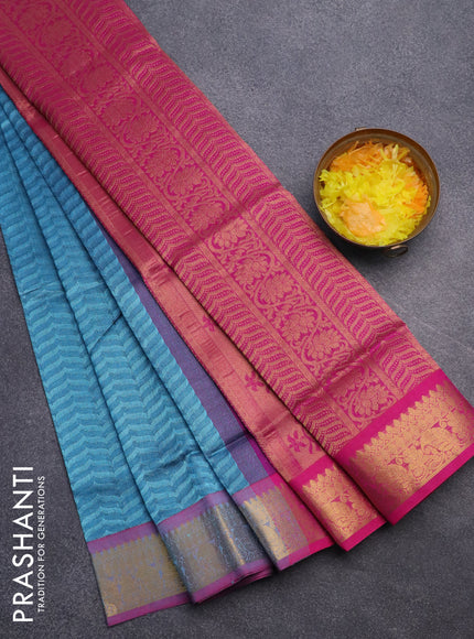 Silk cotton saree blue shade and magenta pink with allover self emboss jacquard and rich zari woven border