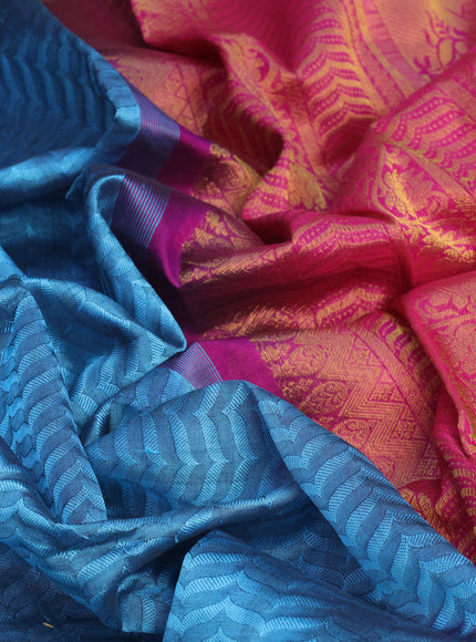 Silk cotton saree blue shade and magenta pink with allover self emboss jacquard and rich zari woven border