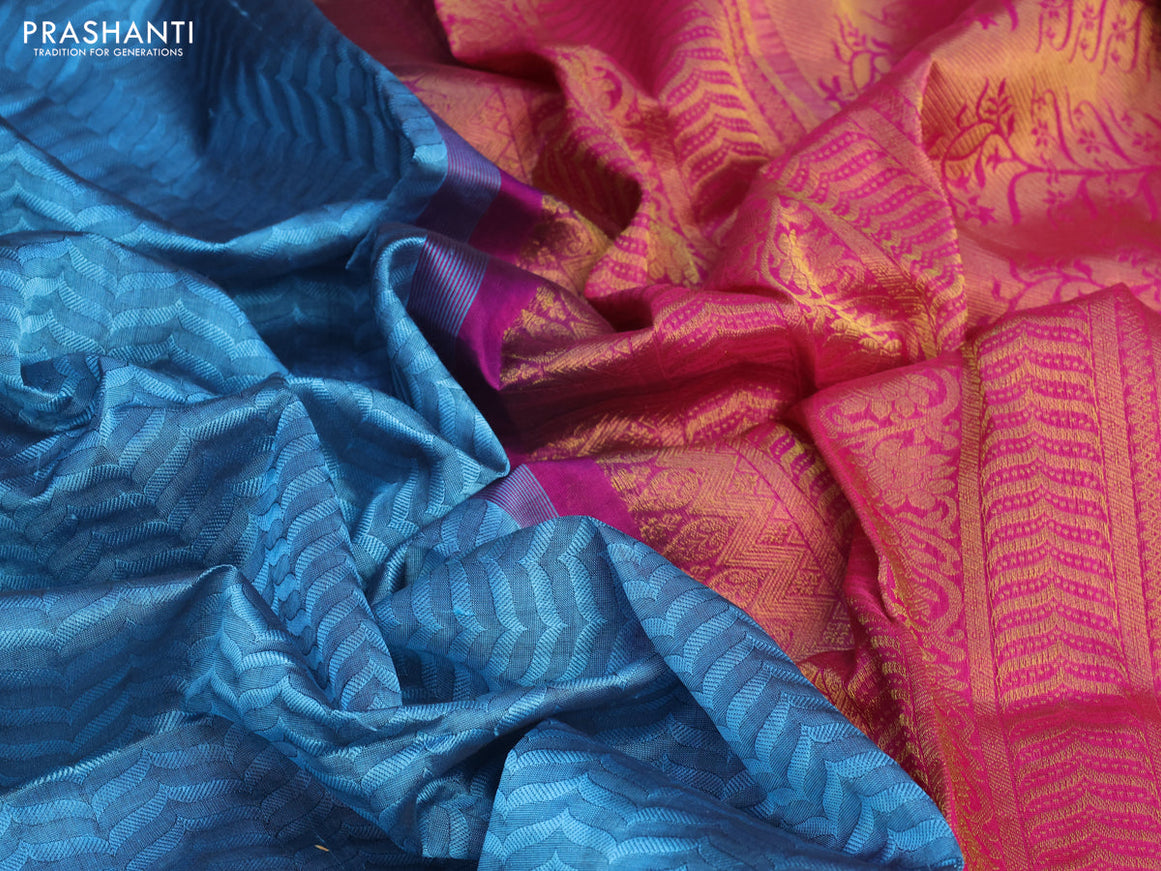 Silk cotton saree blue shade and magenta pink with allover self emboss jacquard and rich zari woven border