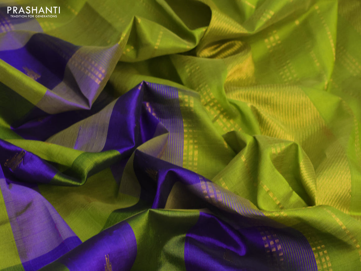 Silk cotton saree blue and light green with allover paalum pazhamum checks & temple zari buttas and zari woven border