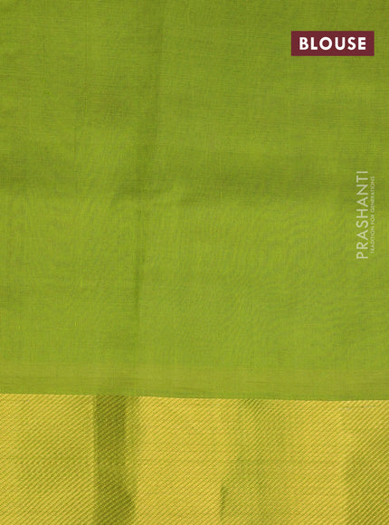 Silk cotton saree blue and light green with allover paalum pazhamum checks & temple zari buttas and zari woven border