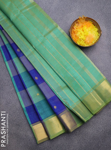 Silk cotton saree green shade and blue with allover paalum pazhamum checks & zari buttas and zari woven border