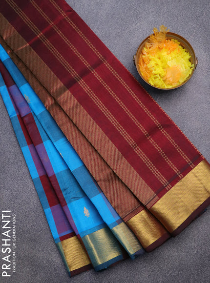 Silk cotton saree cs blue and deep maroon with allover paalum pazhamum checks & zari buttas and zari woven border