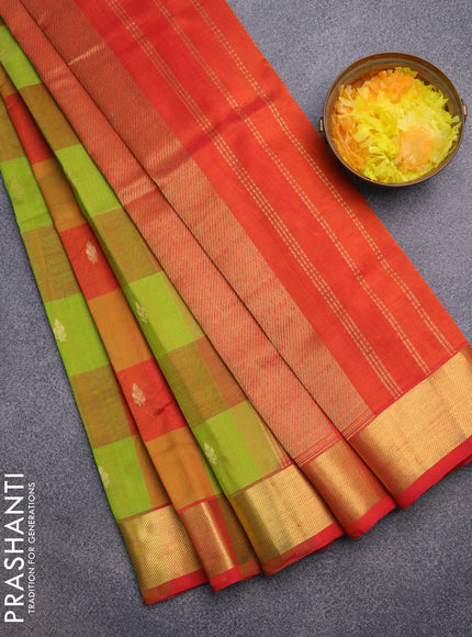 Silk cotton saree light green and orange with allover paalum pazhamum checks & zari buttas and zari woven border