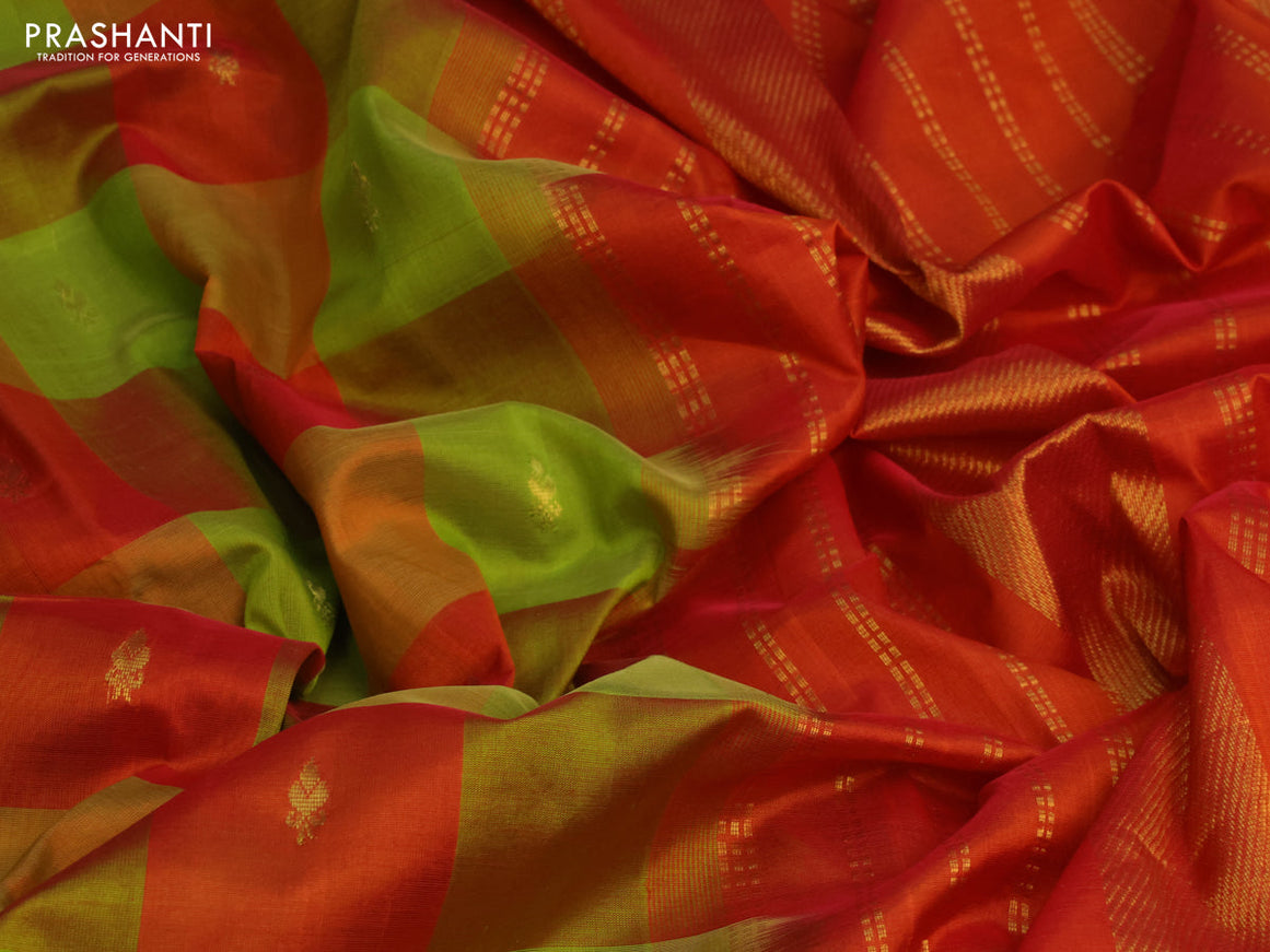 Silk cotton saree light green and orange with allover paalum pazhamum checks & zari buttas and zari woven border