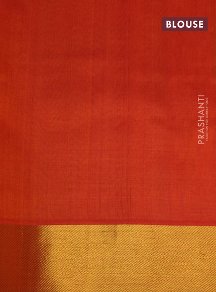 Silk cotton saree light green and orange with allover paalum pazhamum checks & zari buttas and zari woven border