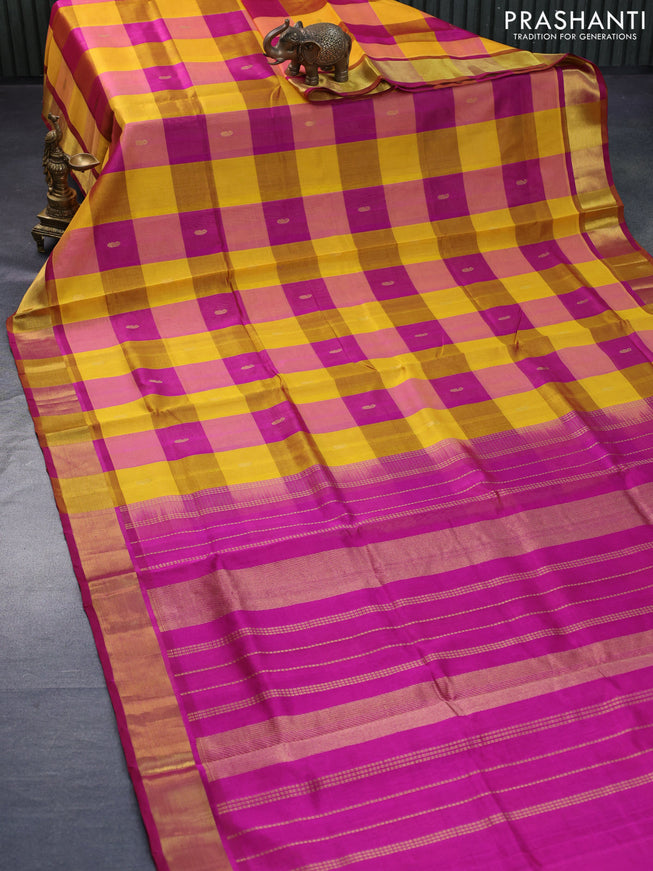 Silk cotton saree yellow and magenta pink with allover paalum pazhamum checks & paisley zari buttas and zari woven border