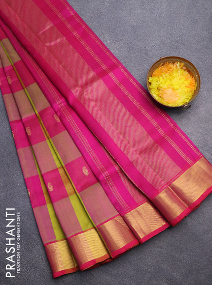 Silk cotton saree light green and magenta pink with allover paalum pazhamum checks & paisley zari buttas and zari woven border