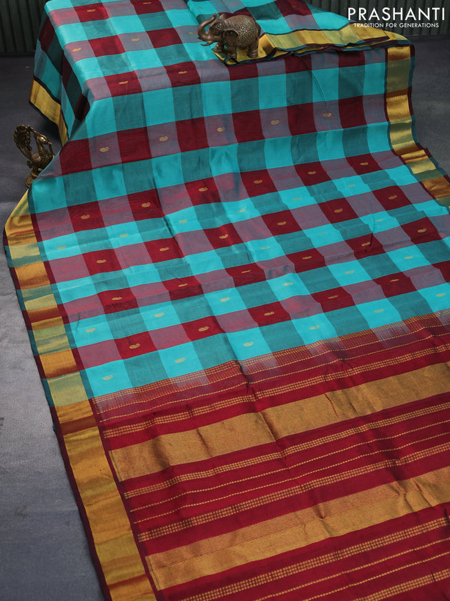 Silk cotton saree deep maroon and teal green with allover paalum pazhamum checks & paisley zari buttas and zari woven border