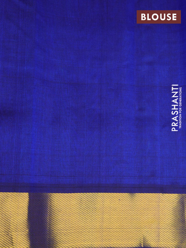 Silk cotton saree light blue and blue with allover paalum pazhamum checks & peacock zari buttas and zari woven border