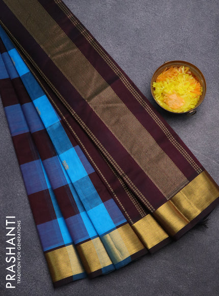 Silk cotton saree cs blue and coffee brown with allover paalum pazhamum checks & peacock zari buttas and zari woven border