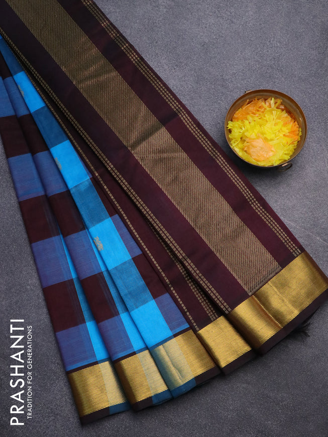 Silk cotton saree cs blue and coffee brown with allover paalum pazhamum checks & peacock zari buttas and zari woven border