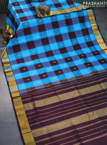 Silk cotton saree cs blue and coffee brown with allover paalum pazhamum checks & peacock zari buttas and zari woven border