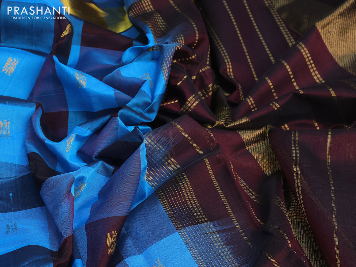 Silk cotton saree cs blue and coffee brown with allover paalum pazhamum checks & peacock zari buttas and zari woven border