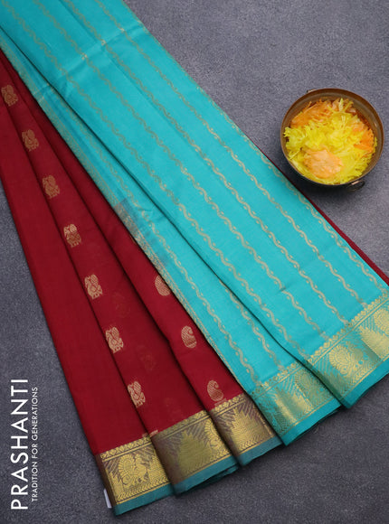 Silk cotton saree maroon and teal green with paisley & annam zari woven buttas and annam & temple design zari woven border