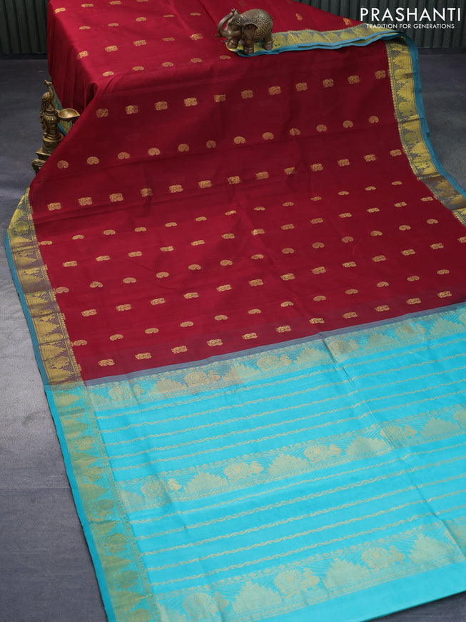 Silk cotton saree maroon and teal green with paisley & annam zari woven buttas and annam & temple design zari woven border